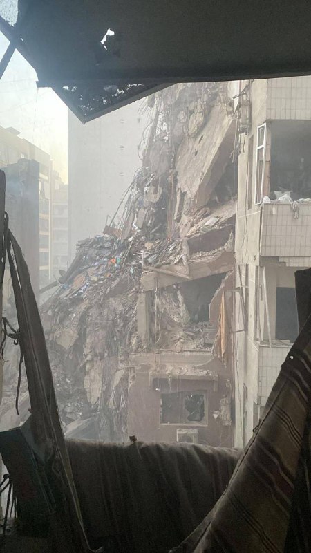 Initial reports of a building that collapsed in the Dahiyeh district of southern Beirut. Report of casualties