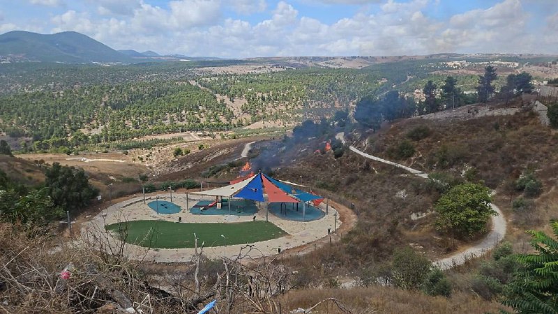 A rocket impacted near a children's playground in Tzfat causing a fire