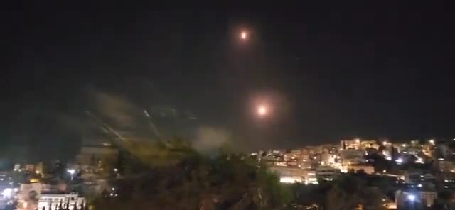 Interceptors being launched from near Haifa, against incoming Projectiles launched from Southern Lebanon