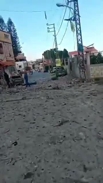 The scene from the town of Sir al-Gharbiya after it was targeted by an Israeli airstrike.